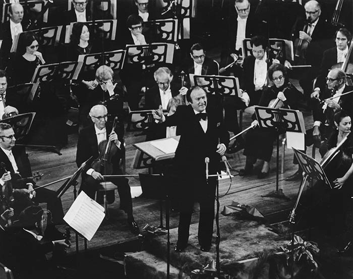 Robert Page conducting the audience in 1975 “Sing Messiah!” concert. 