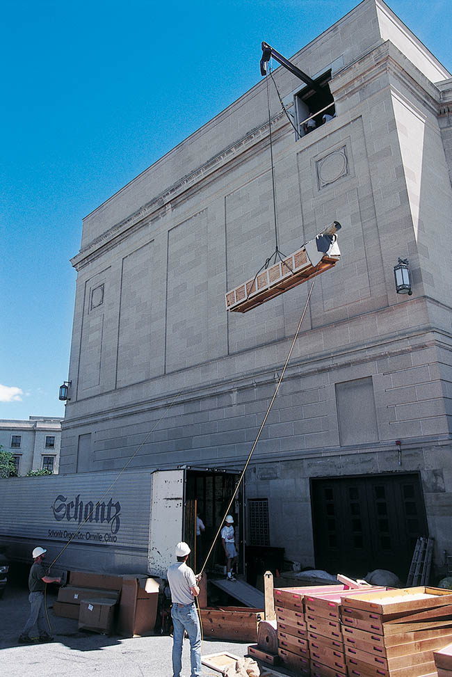 Photo of the organ being lifted into severance hall