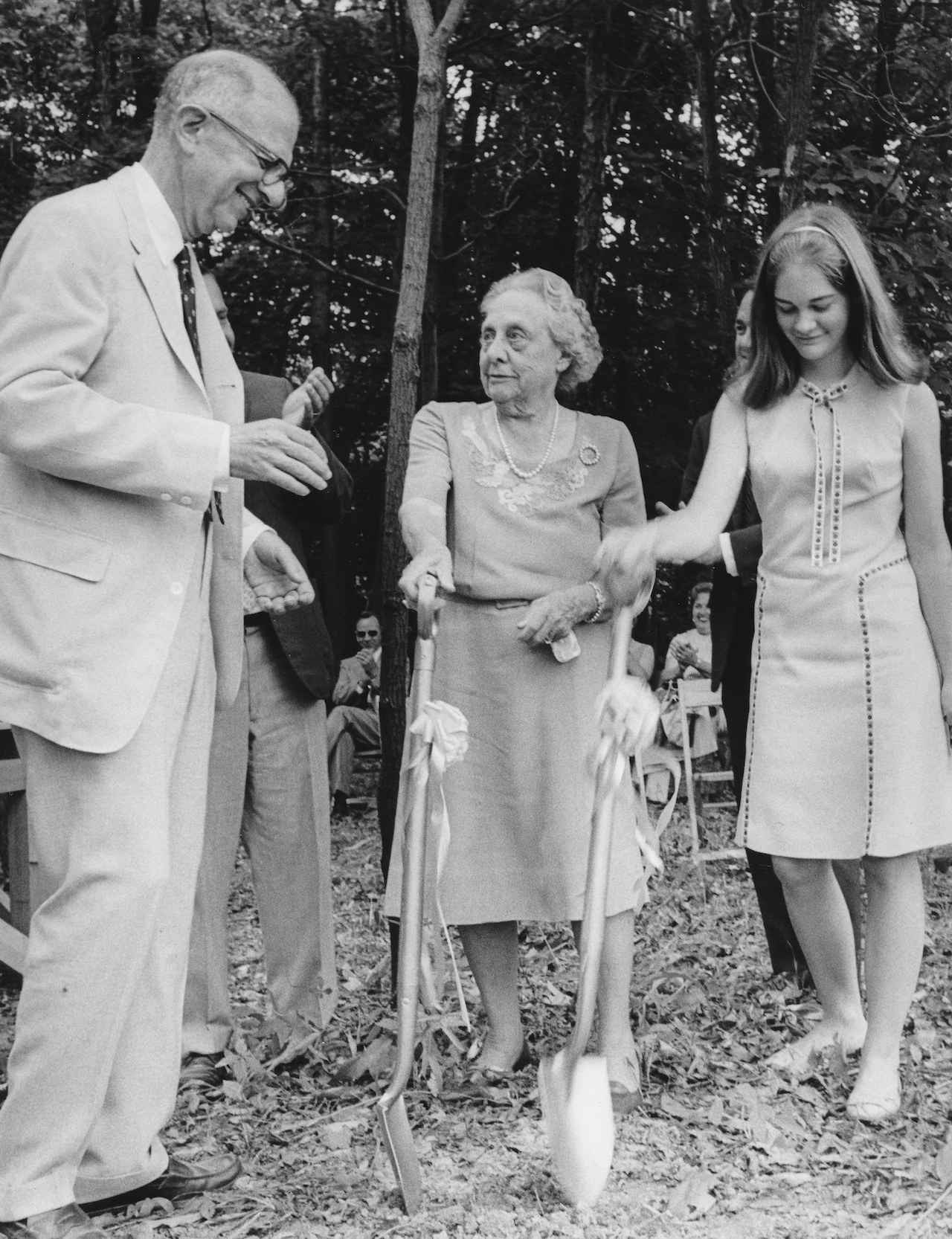 Former Musical Arts Association President Frank E. Joseph, Mrs. Dudley Blossom, Sr., and her granddaughter, Betsy Blossom, prepare to ceremoniously dig the first shovels of dirt