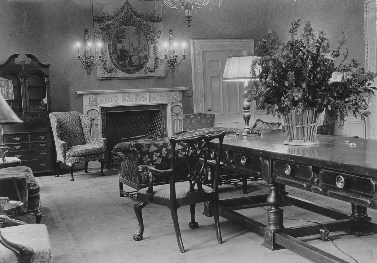 The Rankin Board Room complete with ornate furniture and marble doorways, 1931.
