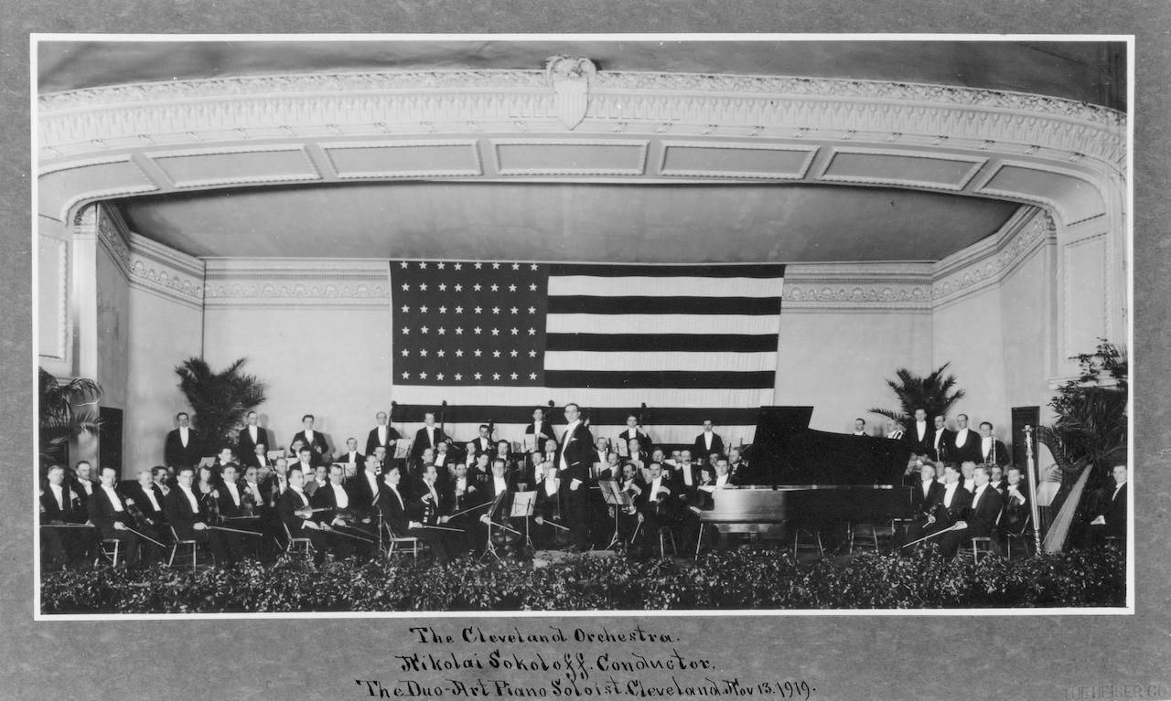 The Cleveland Orchestra and Sokoloff pose with the Duo-Art Player Piano in one of their first group photographs in November 1919 at Gray’s Armory in Cleveland.